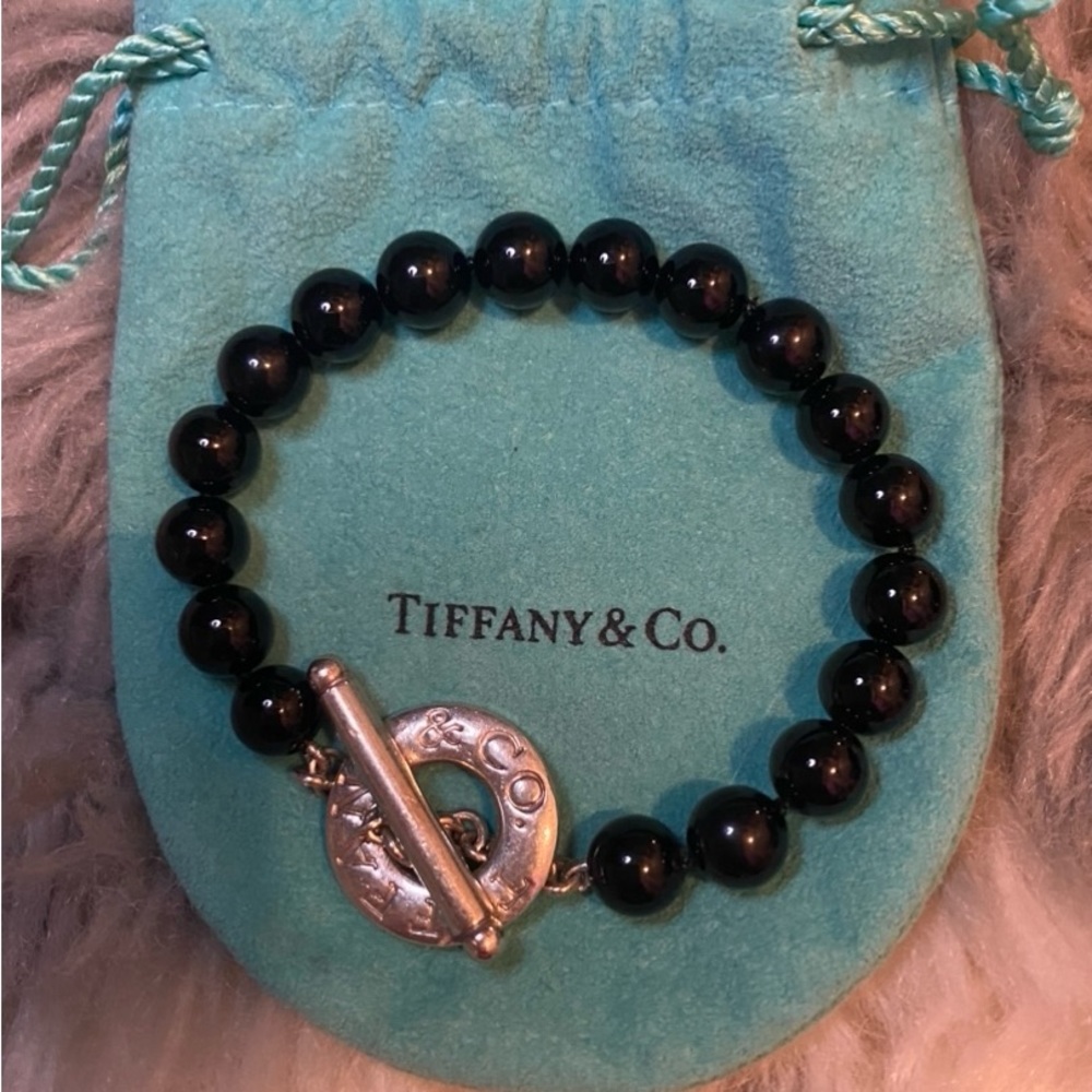 I am selling this timeless, stackable, Tiffany’s black onyx beaded bracelet.
